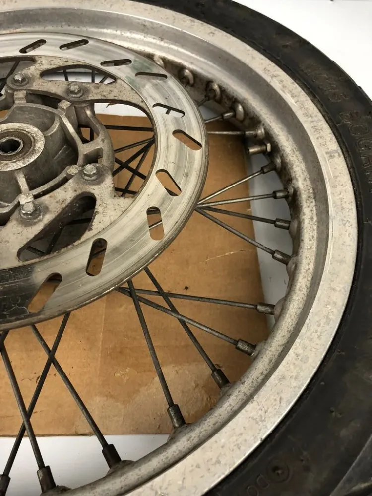 vordere Speichenfelge mit Reifen, Derbi/Aprilia/Gilera, 100/80-17, 12mm Achsdurchmesser