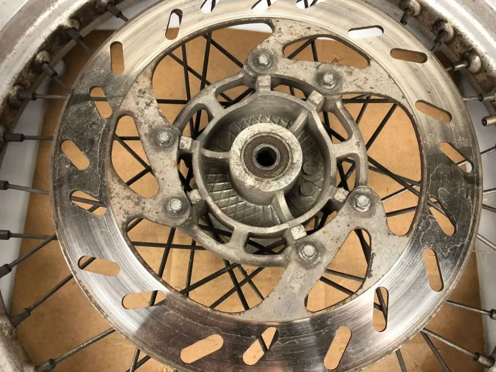 vordere Speichenfelge mit Reifen, Derbi/Aprilia/Gilera, 100/80-17, 12mm Achsdurchmesser