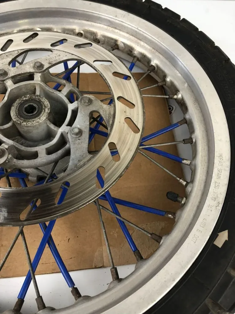 vordere Speichenfelge mit Reifen, Derbi/Aprilia/Gilera, 100/80-17, 12mm Achsdurchmesser