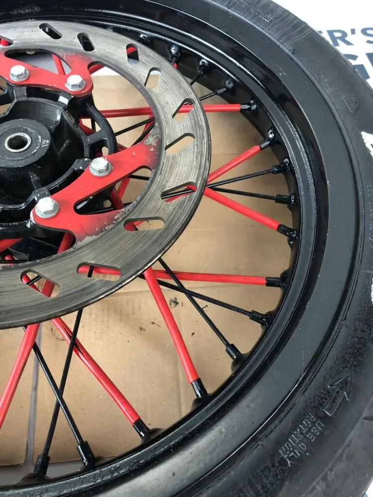 vordere Speichenfelge mit Reifen, Derbi/Aprilia/Gilera, 100/80-17, 12mm Achsdurchmesser
