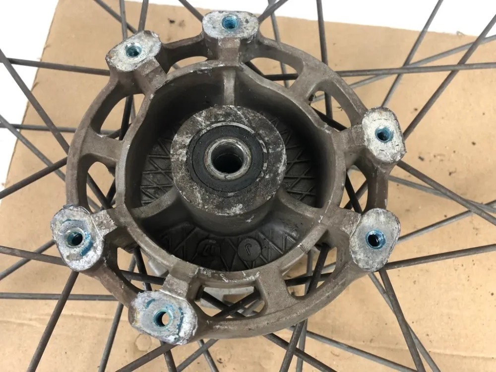 vordere Speichenfelge mit SM Reifen, Derbi/Aprilia/Gilera, 80/90-21, 12mm Achsdurchmesser