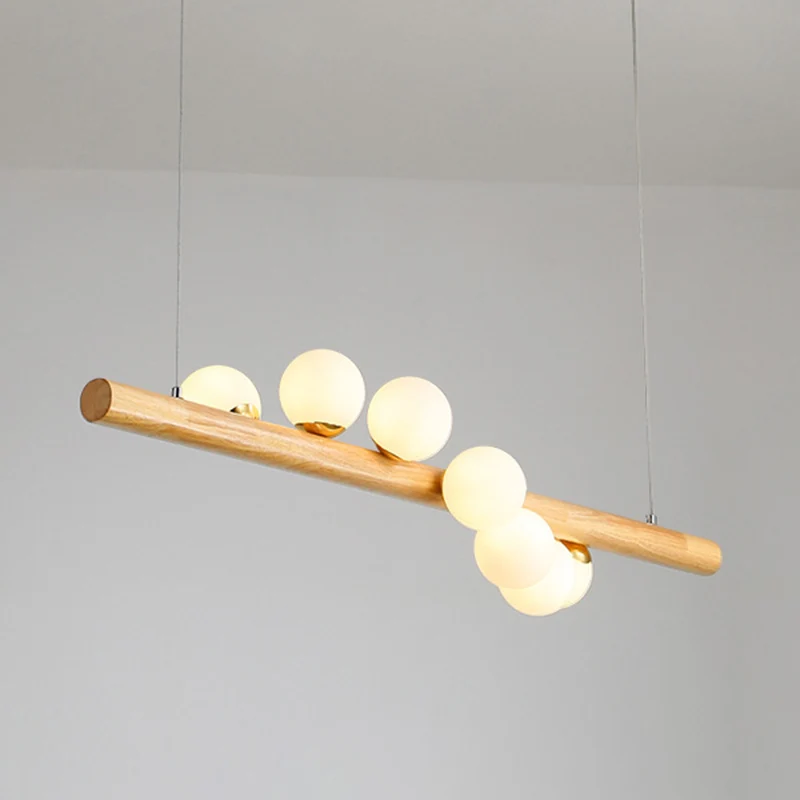 Moderne minimalistische Holz-Linear-Insel-Hängeleuchte, Kugel-Glas-Insel-Deckenleuchte für Wohnzimmer Clearhalo