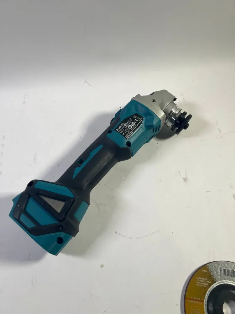 Makita DGA 513 Z Akku Winkelschleifer 18 V 125 mm Brushless - Beschädigt
